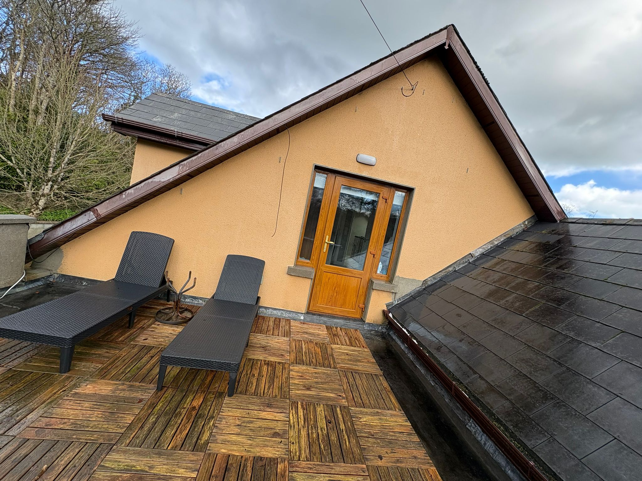 Restored tile roof after BrightView roof painting
