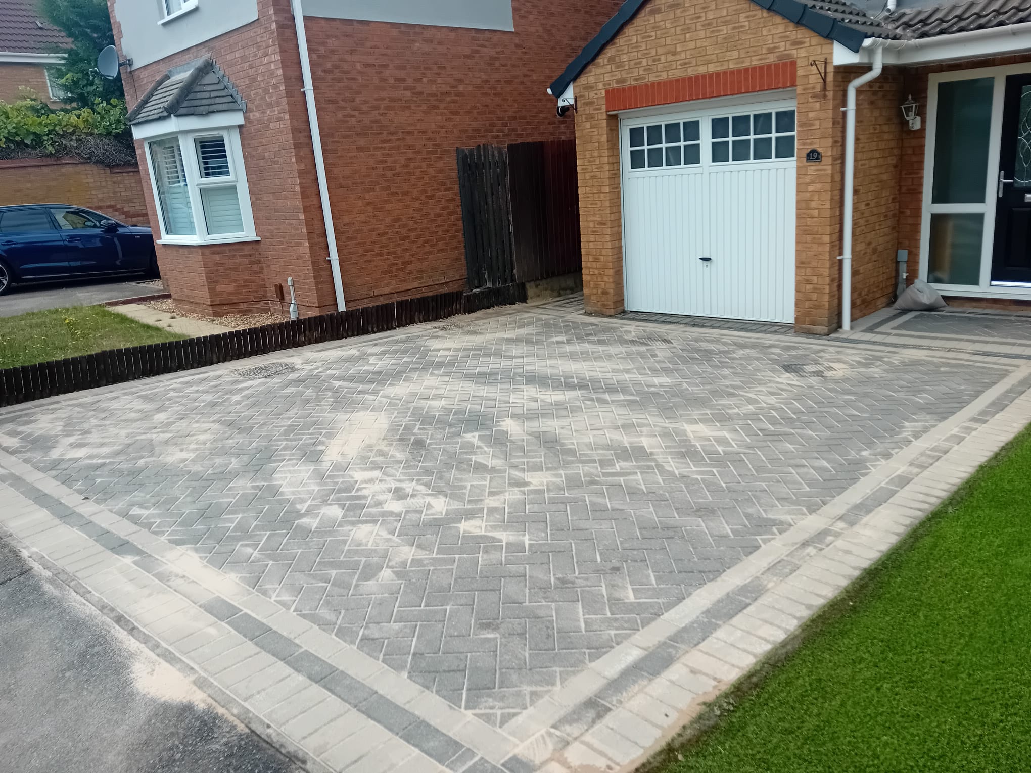 Power washing driveways and patios — BrightView